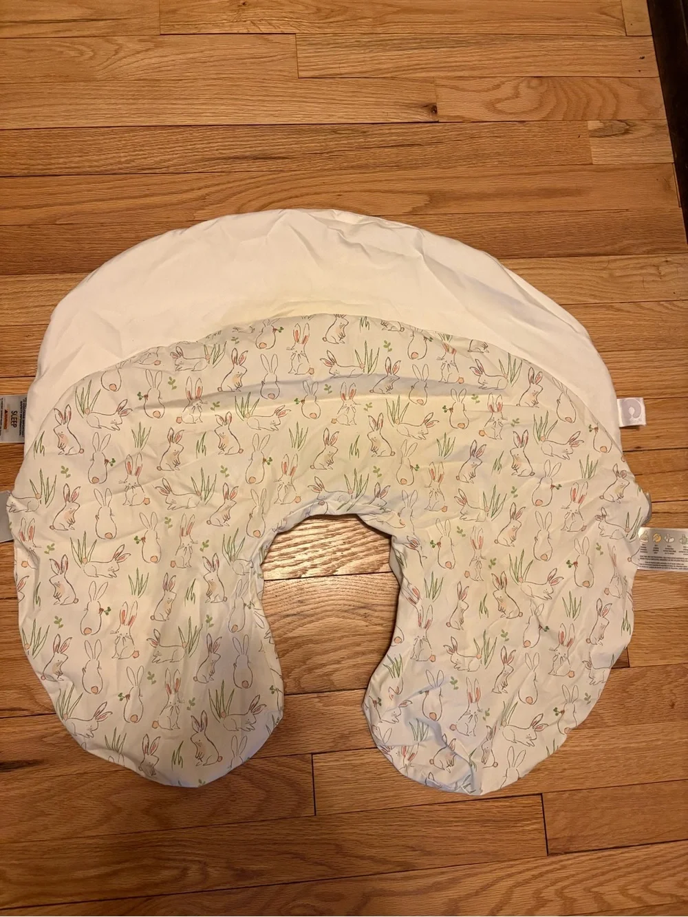 2 Boppy Nursing Pillow Covers one in white and one White with Bunny Print.